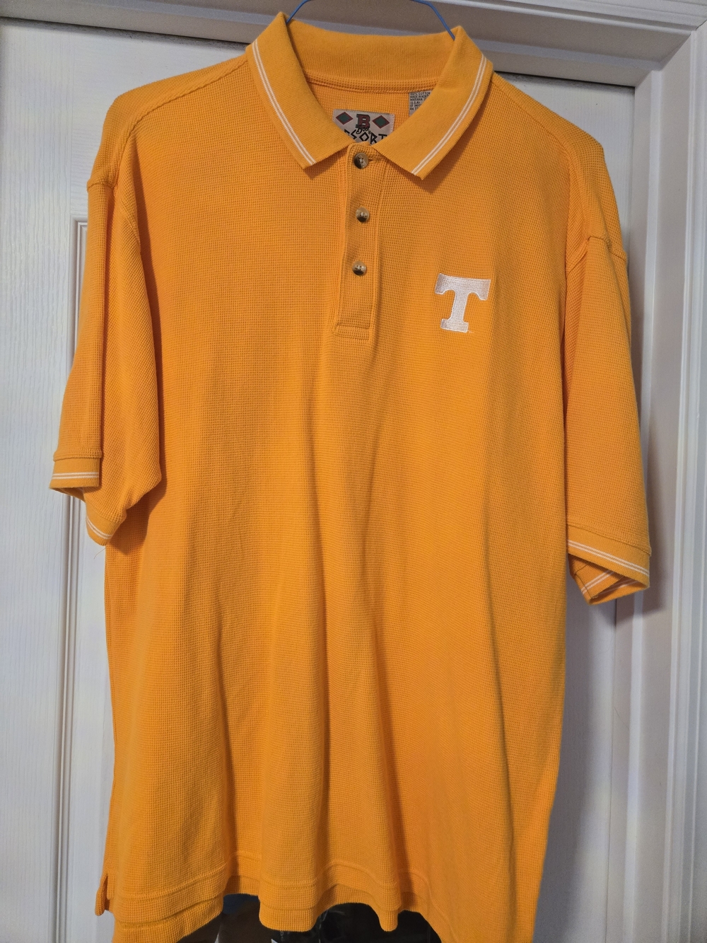 Men's Orange Polo with White 'T' Chest Logo